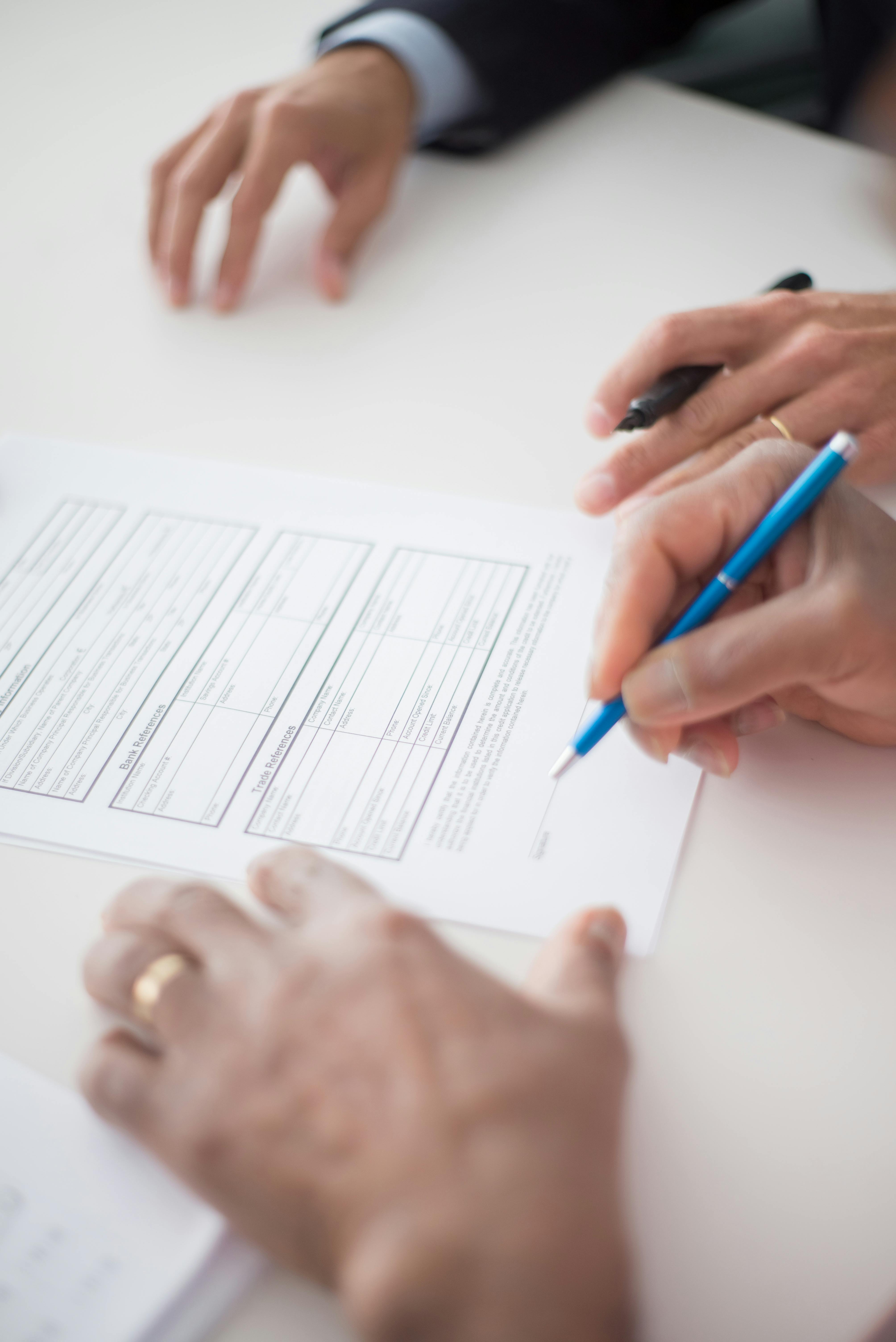 Contract documents and change order files organized on a desk